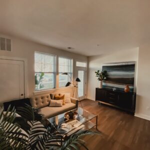 black flat screen tv on black wooden tv rack